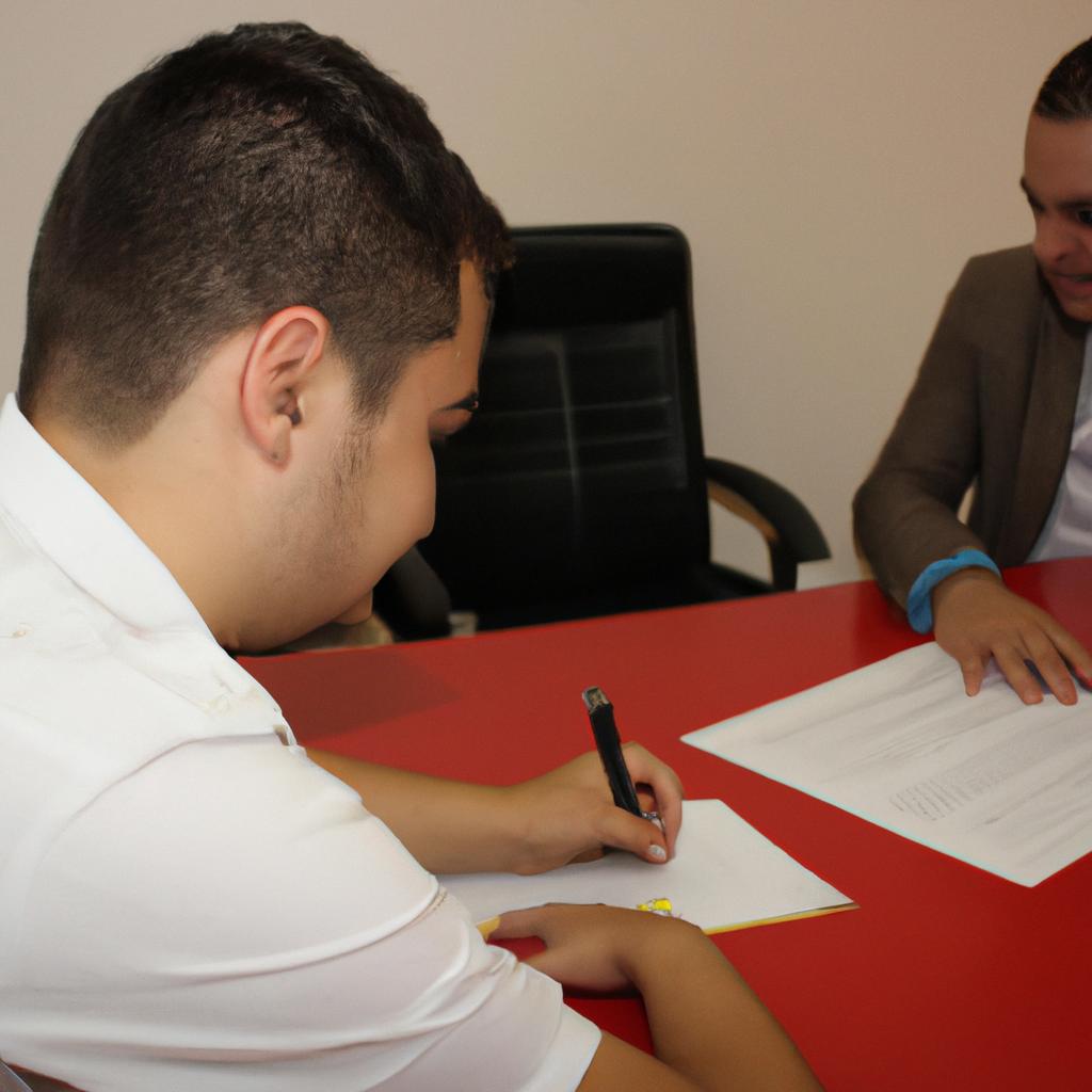 Person signing sponsorship contract, smiling