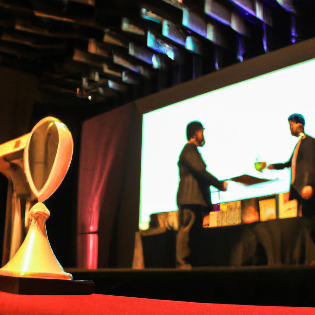Person presenting award on stage
