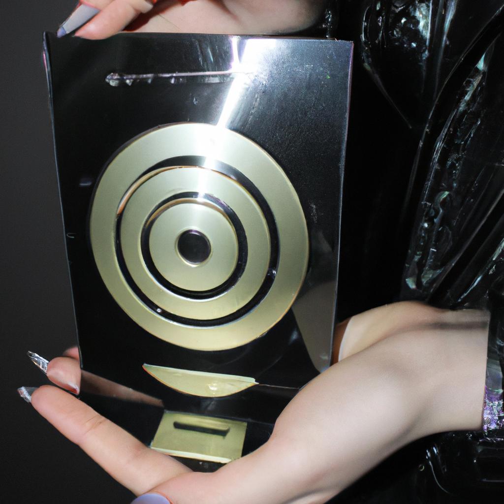 Person holding a music award